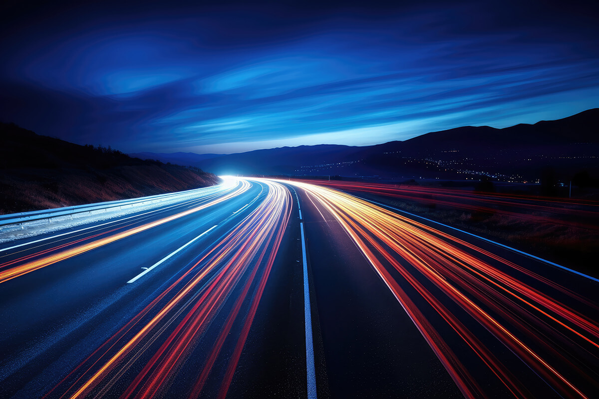 Abstract vehicle taillight streaks on a highway