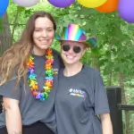 Two people attending the pride event.