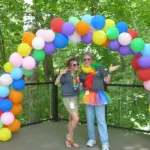 Two people attending the pride event.