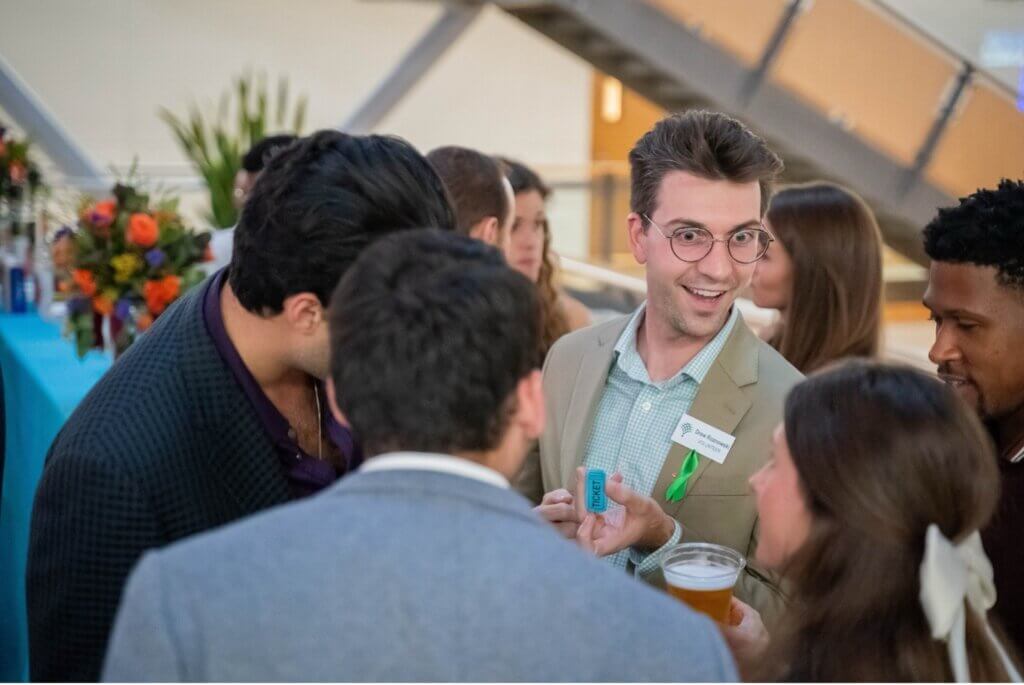 People engaging in conversation at a networking event